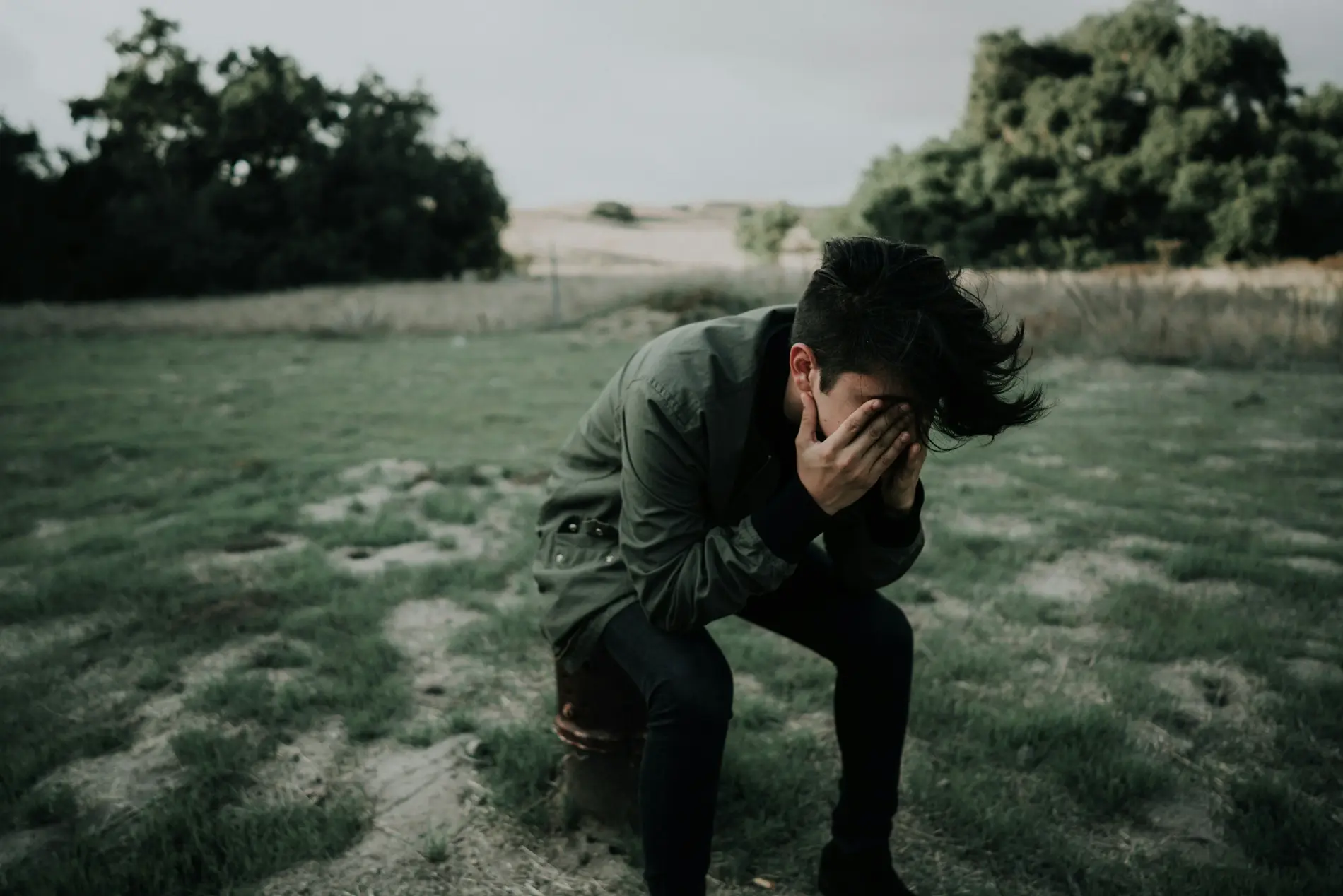 Victim in distress holding head